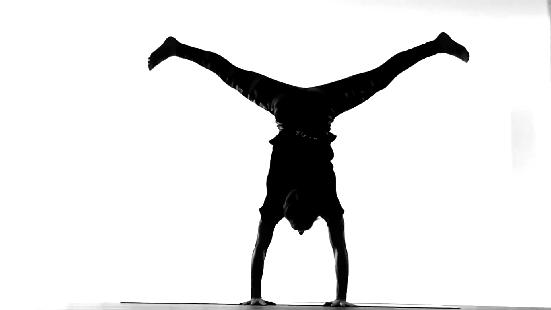 stef bw handstand still.png