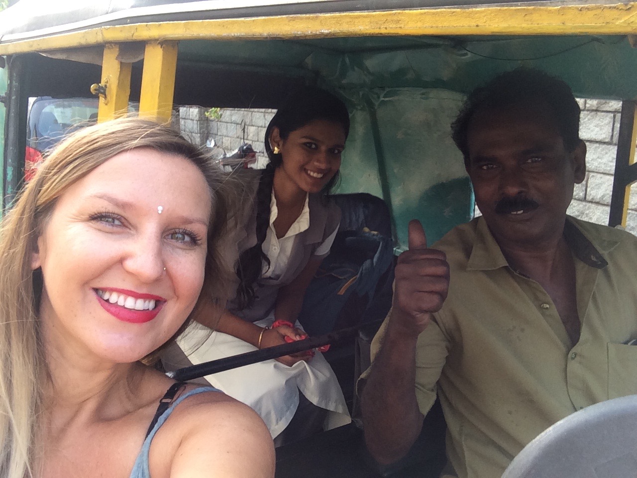 Marta taking a ride in a rickshaw