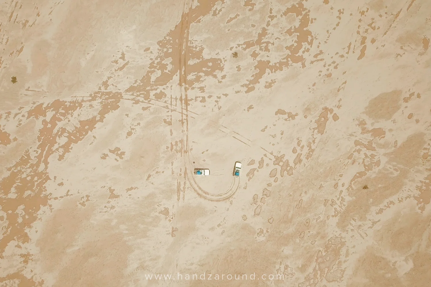 Small cars in the middle of the desert