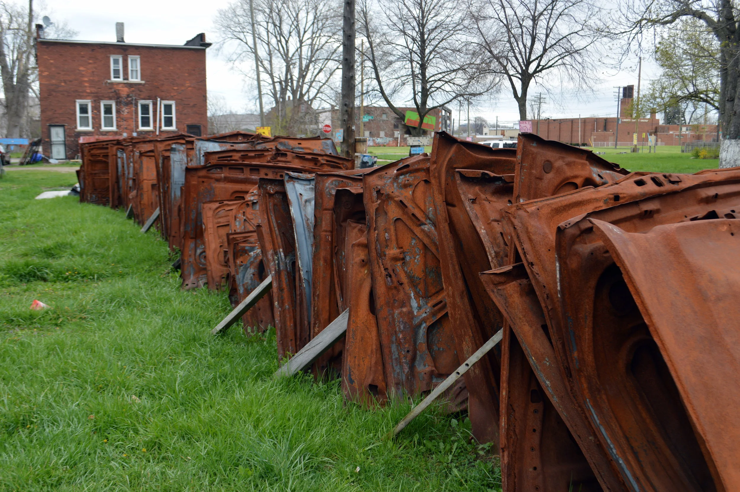 Remnants of detroit's past line up in rust in a neighborhood close to downtown, now a living art exhibit. photo: sharon letts