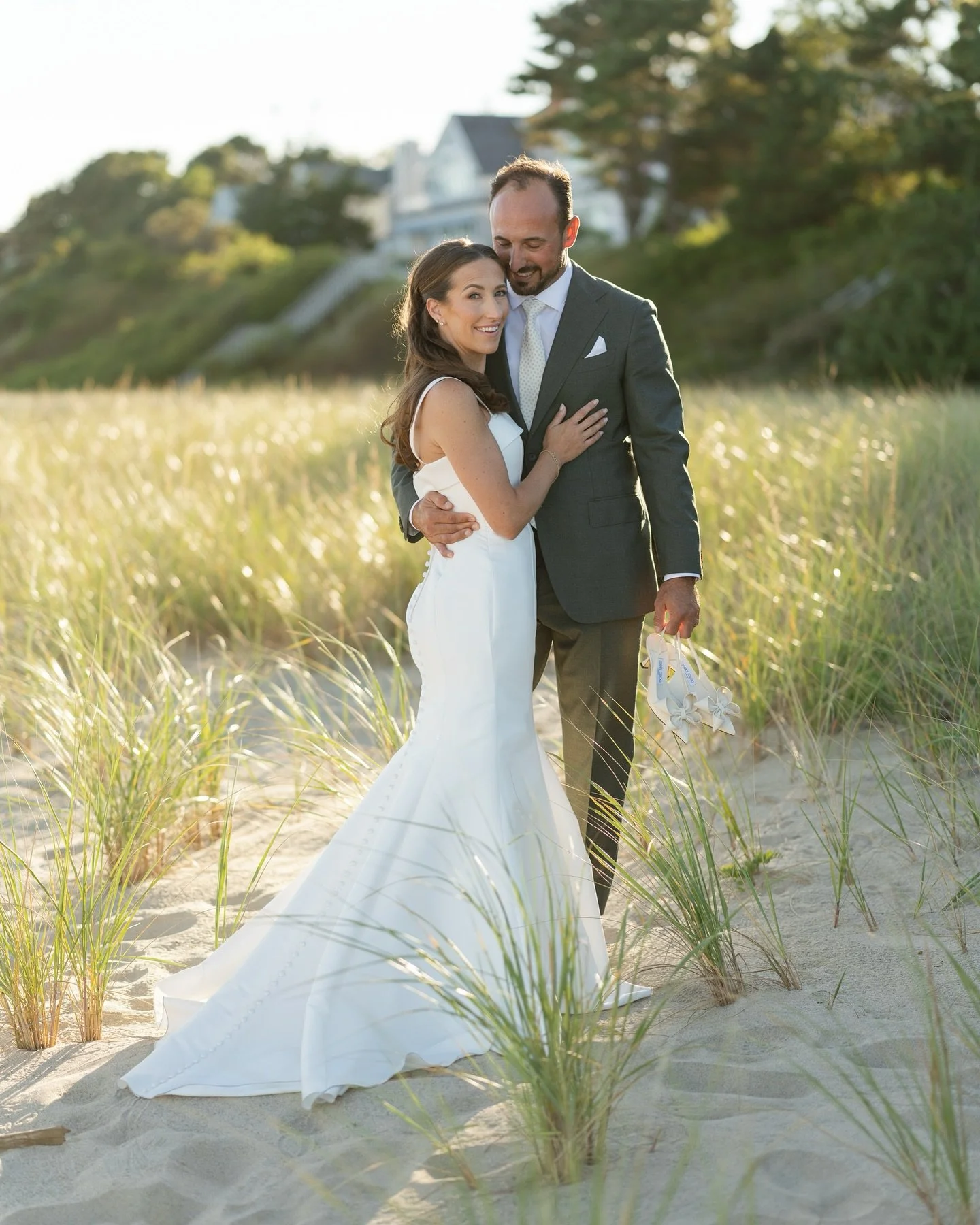 Kate and Anthony spent their childhood summers just three doors apart on Cape Cod—practically neighbors, growing up side by side without realizing that one day they’d end up here: getting married in the same place that held so many summer
