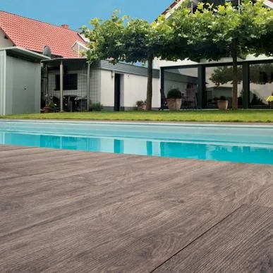 SUNDECK CONTEMPORARY Sundeck is an outdoor interpretation of indoor wood flooring with striations and shading that capture the essence of various wood finishes.