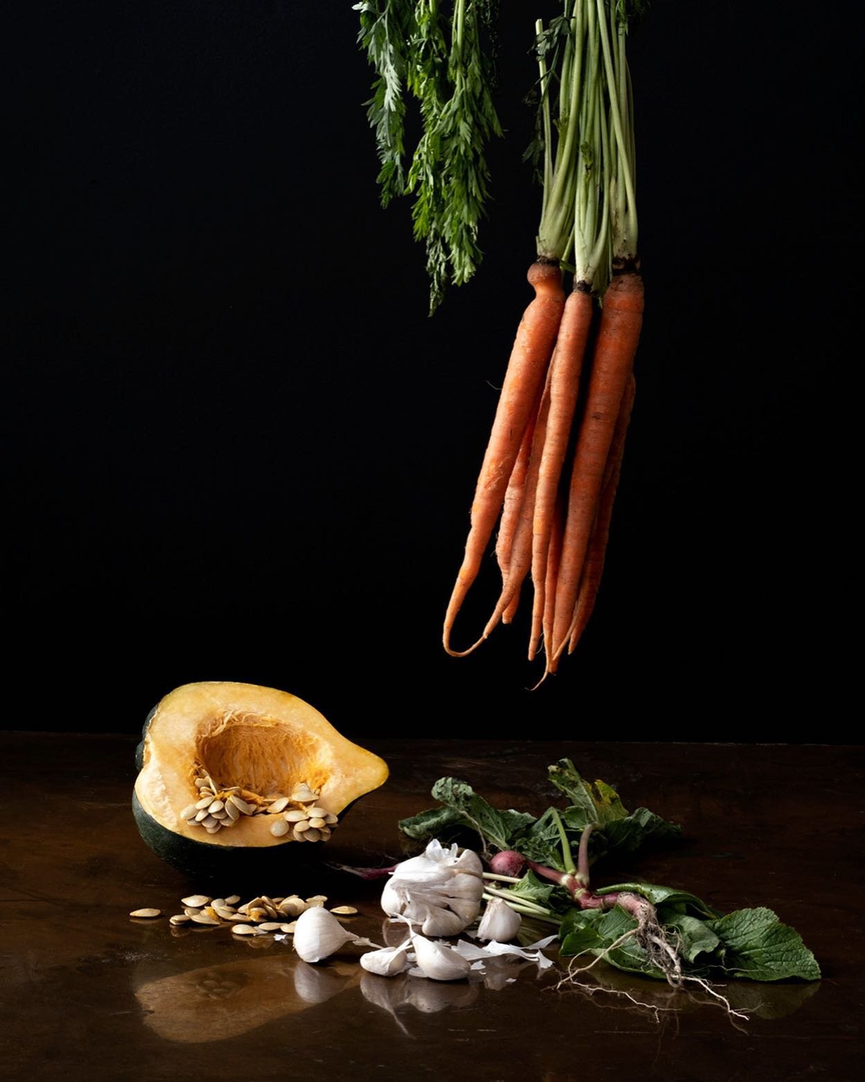 What lies behind us and what lies before us are tiny matters, compared to what lies within us.&quot; - Ralph Waldo Emerson

View full size image on my website...
Photograph of Carrot, Squash, Garlic 
-from the series Bodeg&oacute;n (Still Life)
Archi