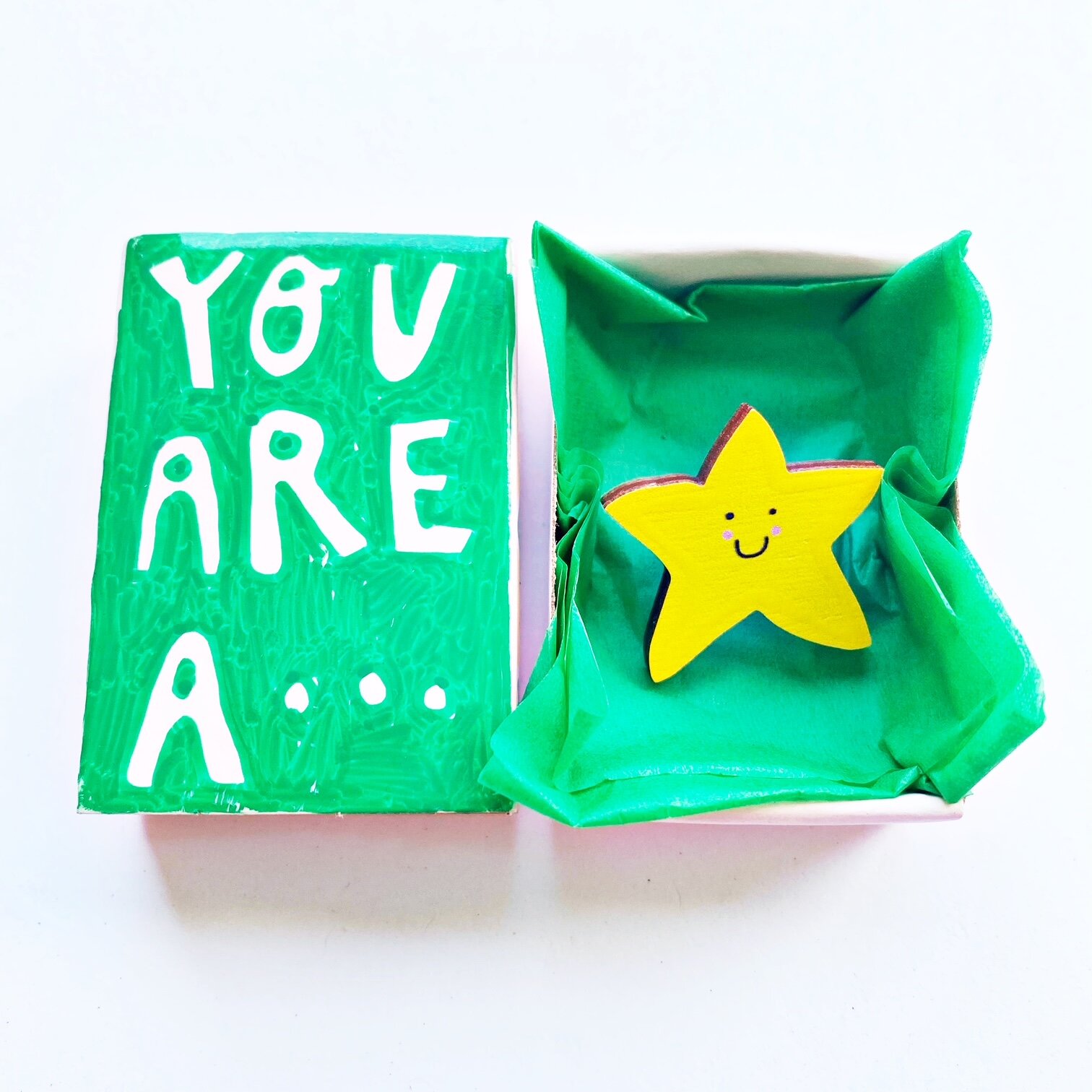 Star pin in hand painted box from £6.00