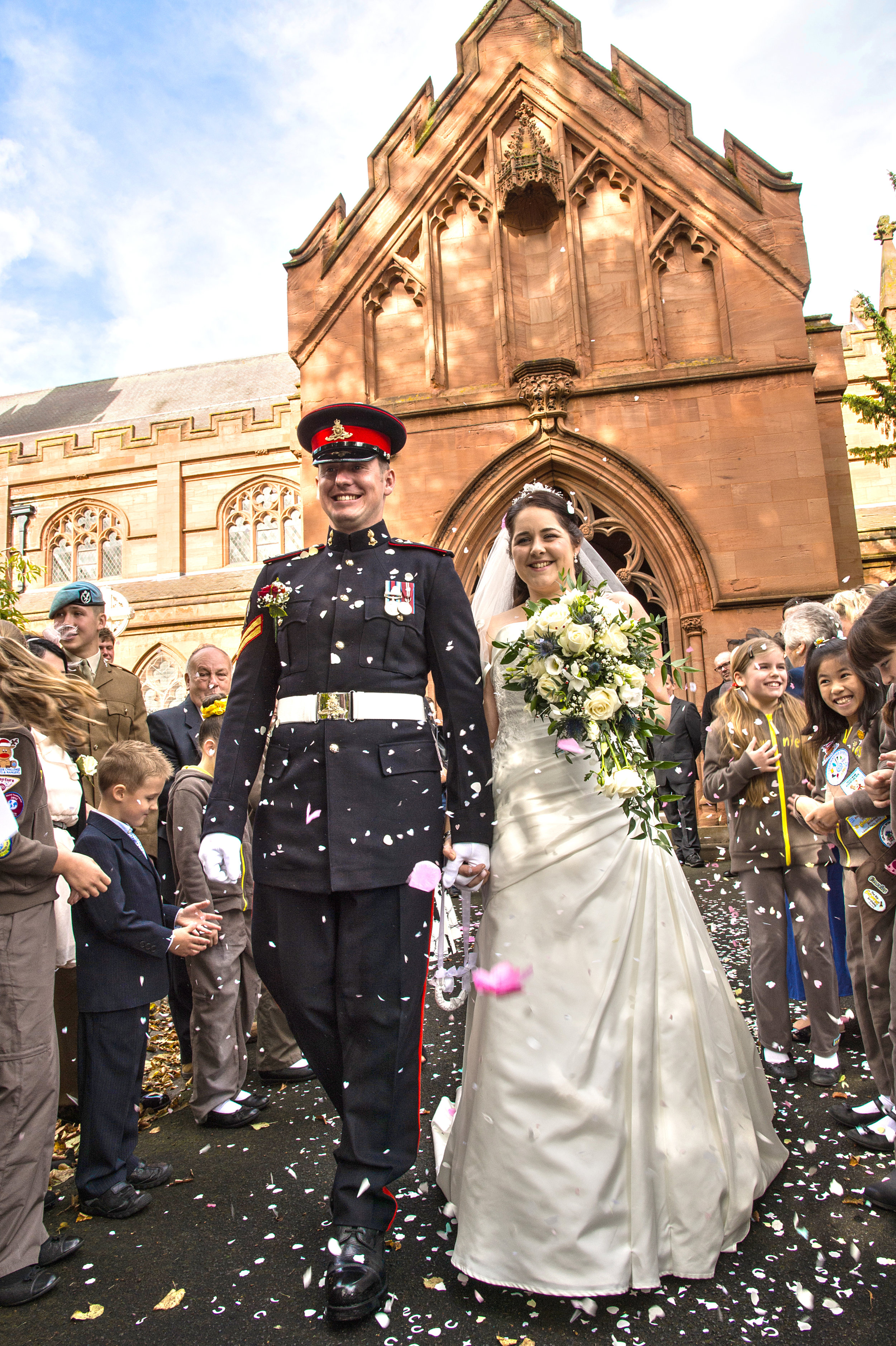 Bride and Groom showered in confetti at St John's Church Kidderminster