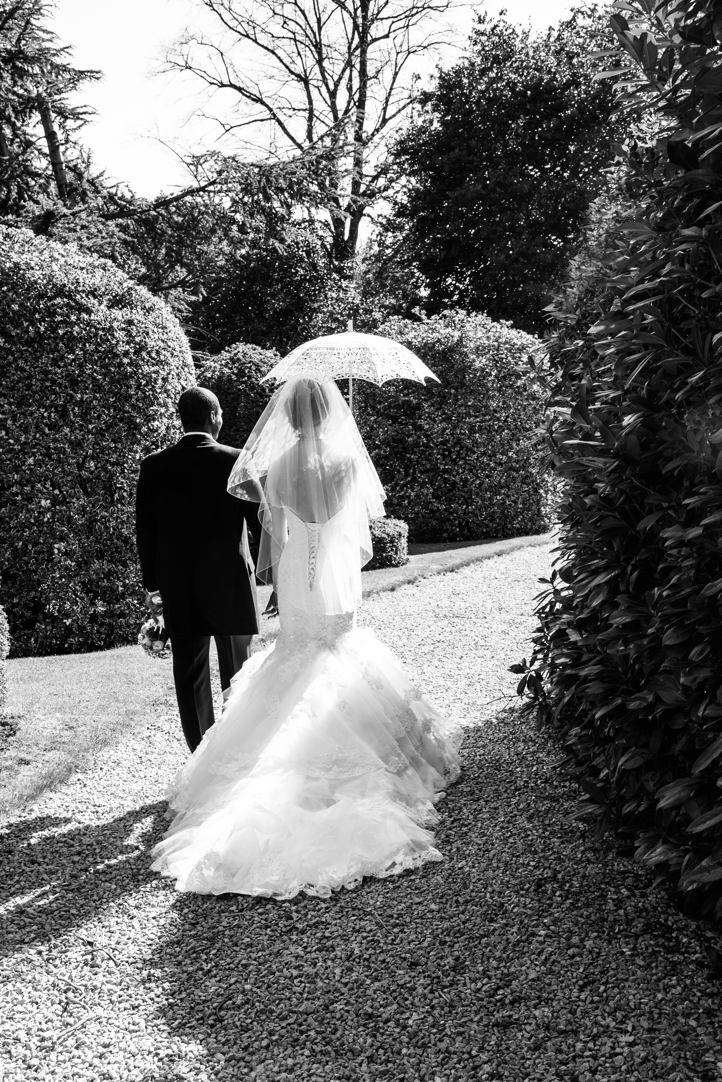 Bride and Groom with parasol Highbury Hall Birmingham West Midlands