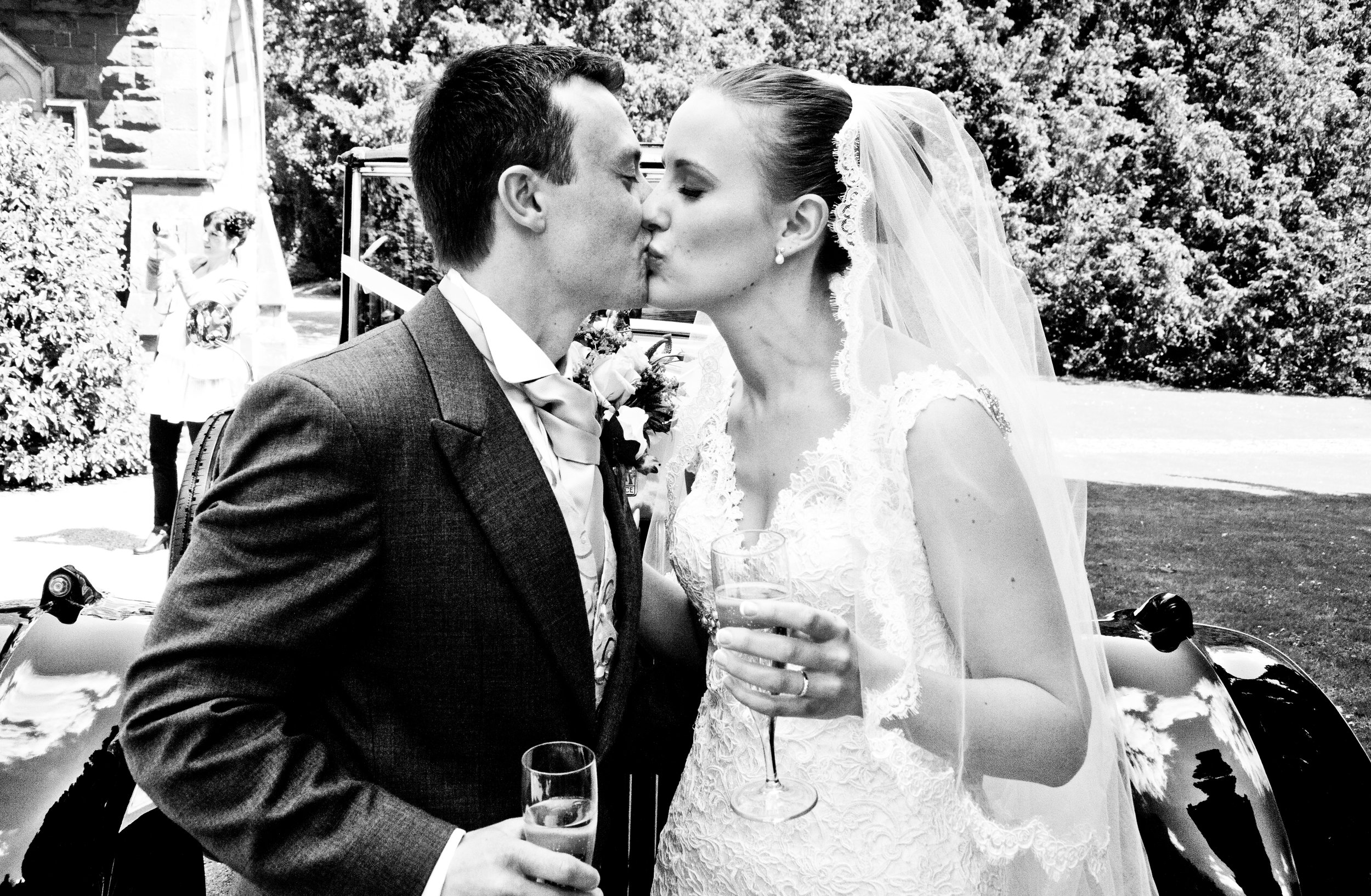 Bride and Groom Kiss Meole Brace Church Shrewsbury Shropshire