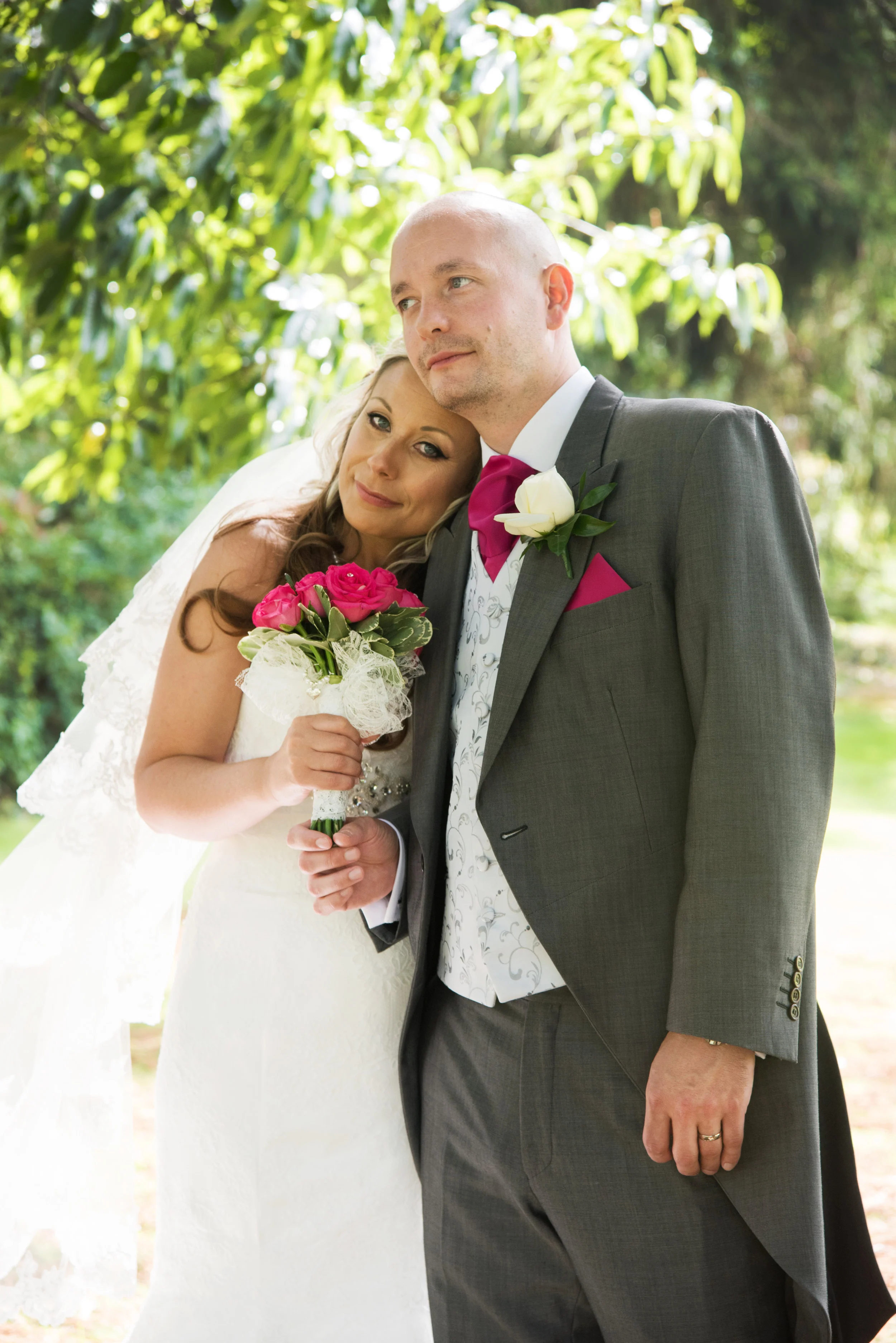 Bride and Groom in gardens of Brandon Hall Hotel Coventry Warwickshire