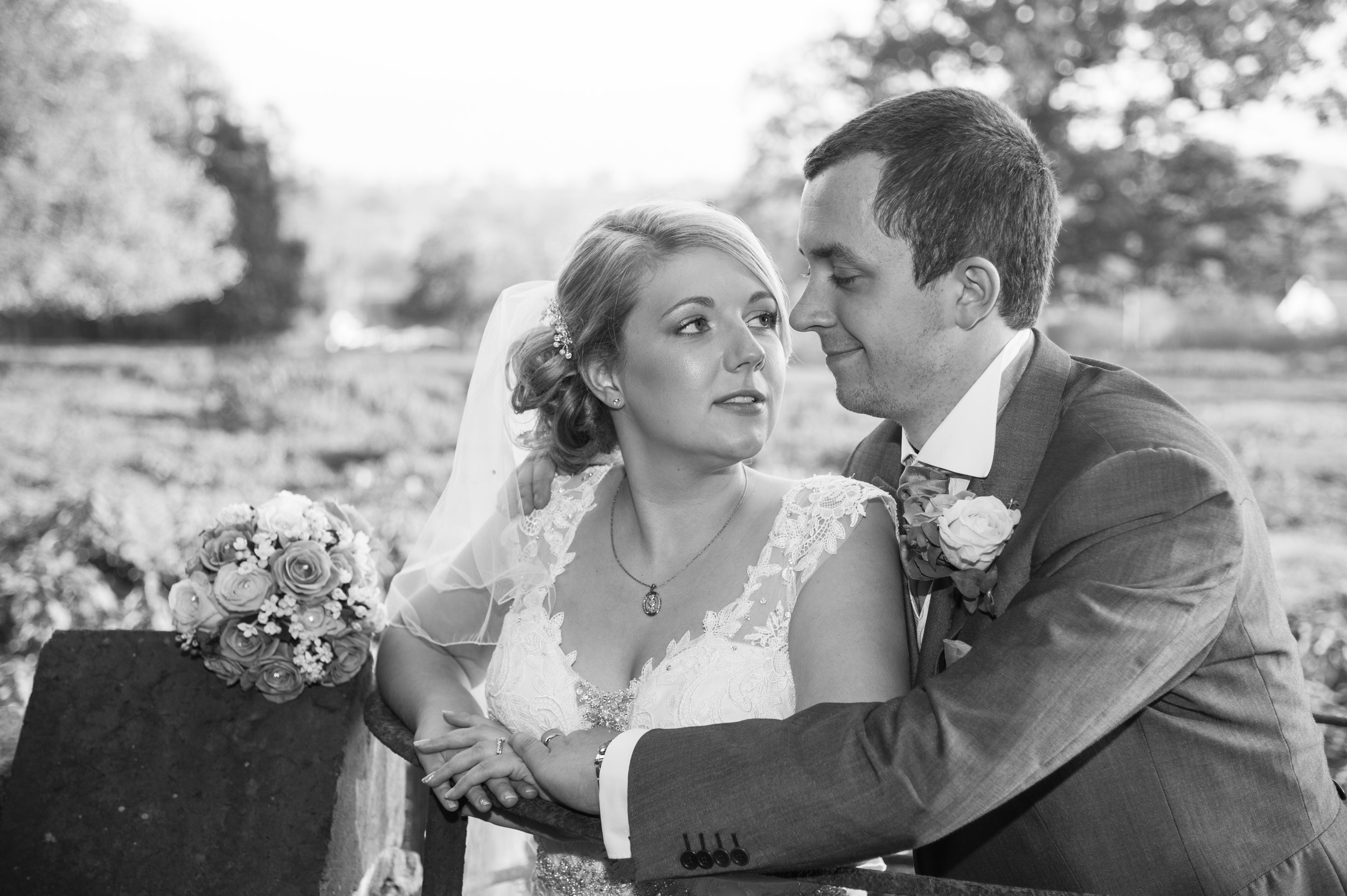 Bride and Groom kiss Aston Lodge Rugby Warwickshire