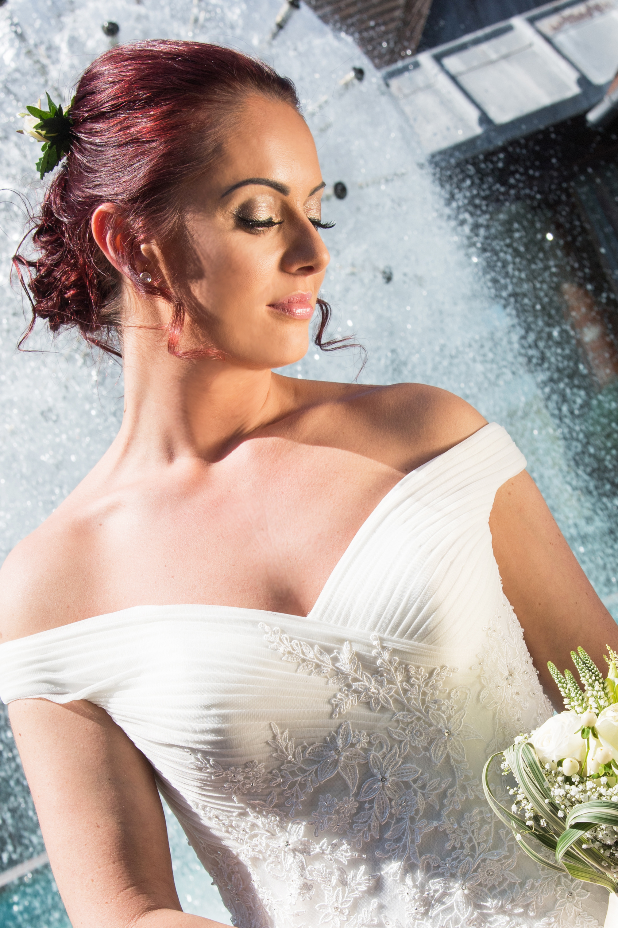 Bride in front of fountain Henley Golf and Country Club