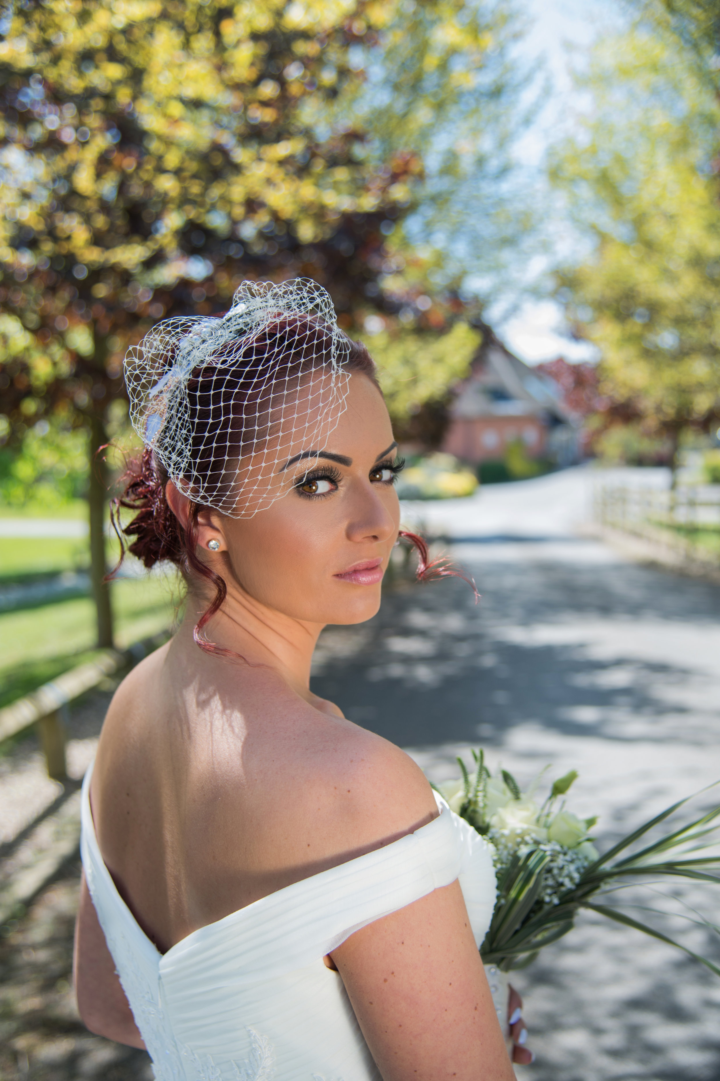 Bride walking to Henley Golf and Country Club Warwickshire