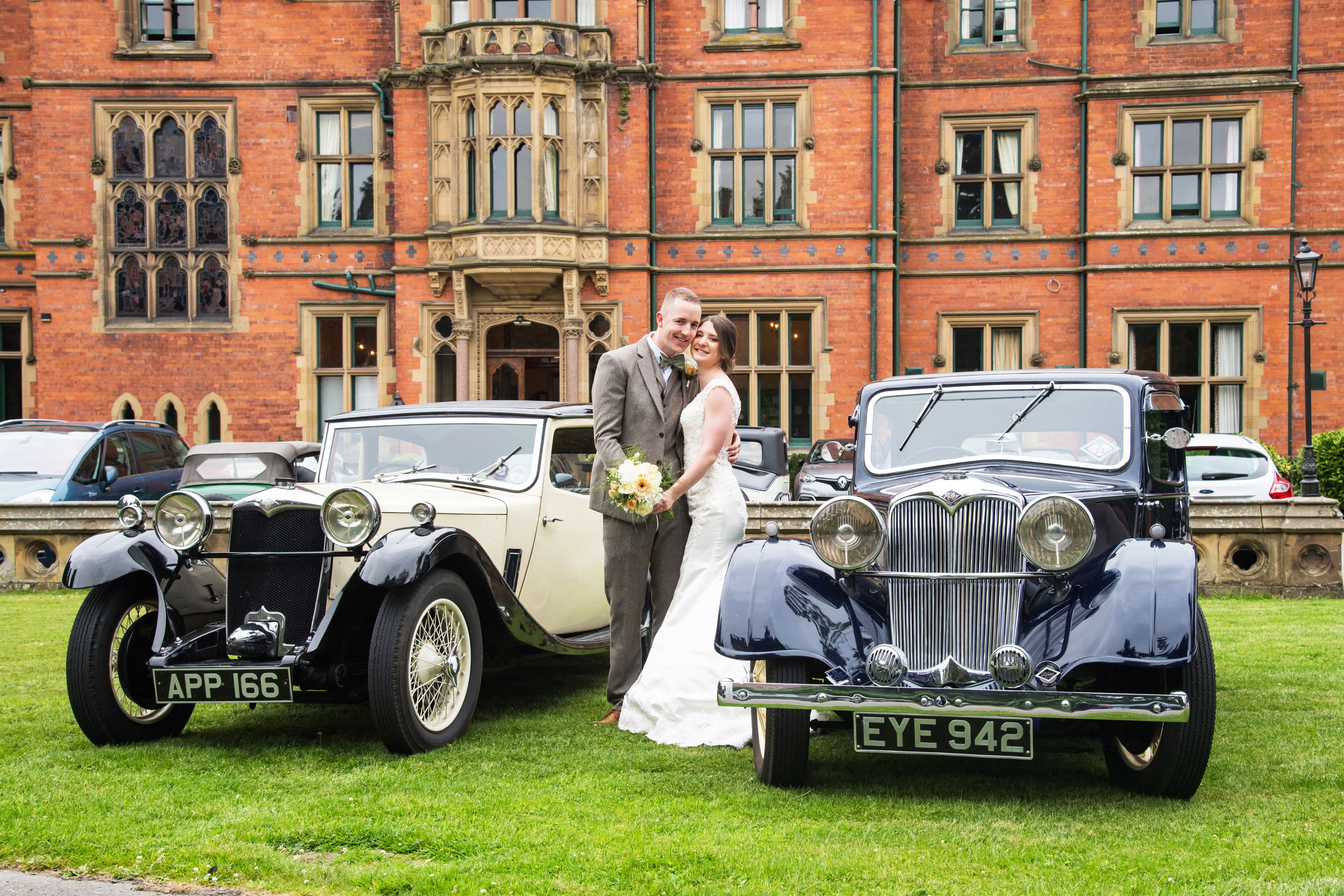 Bride and Groom with vintage cars at Wroxall Abbey Henley in Arden