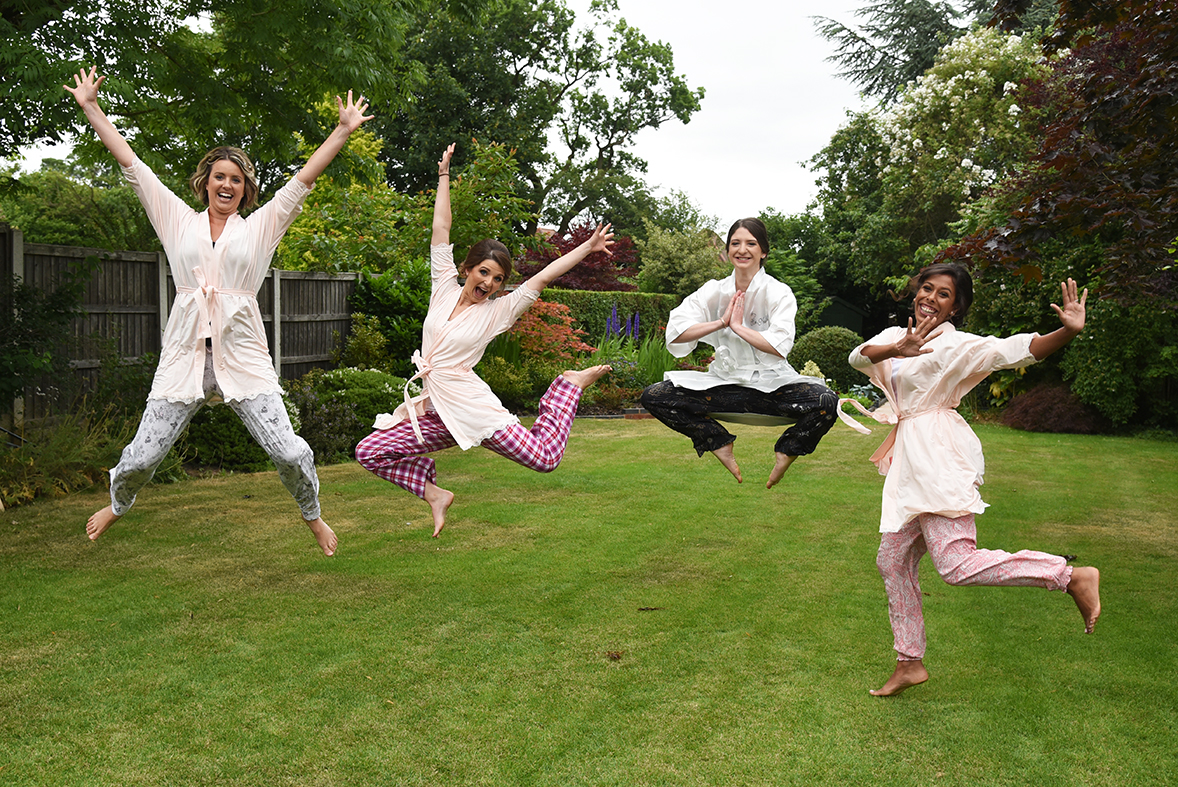 Bride and bridesmaids excited about the wedding at Wroxhall Abbey Henley