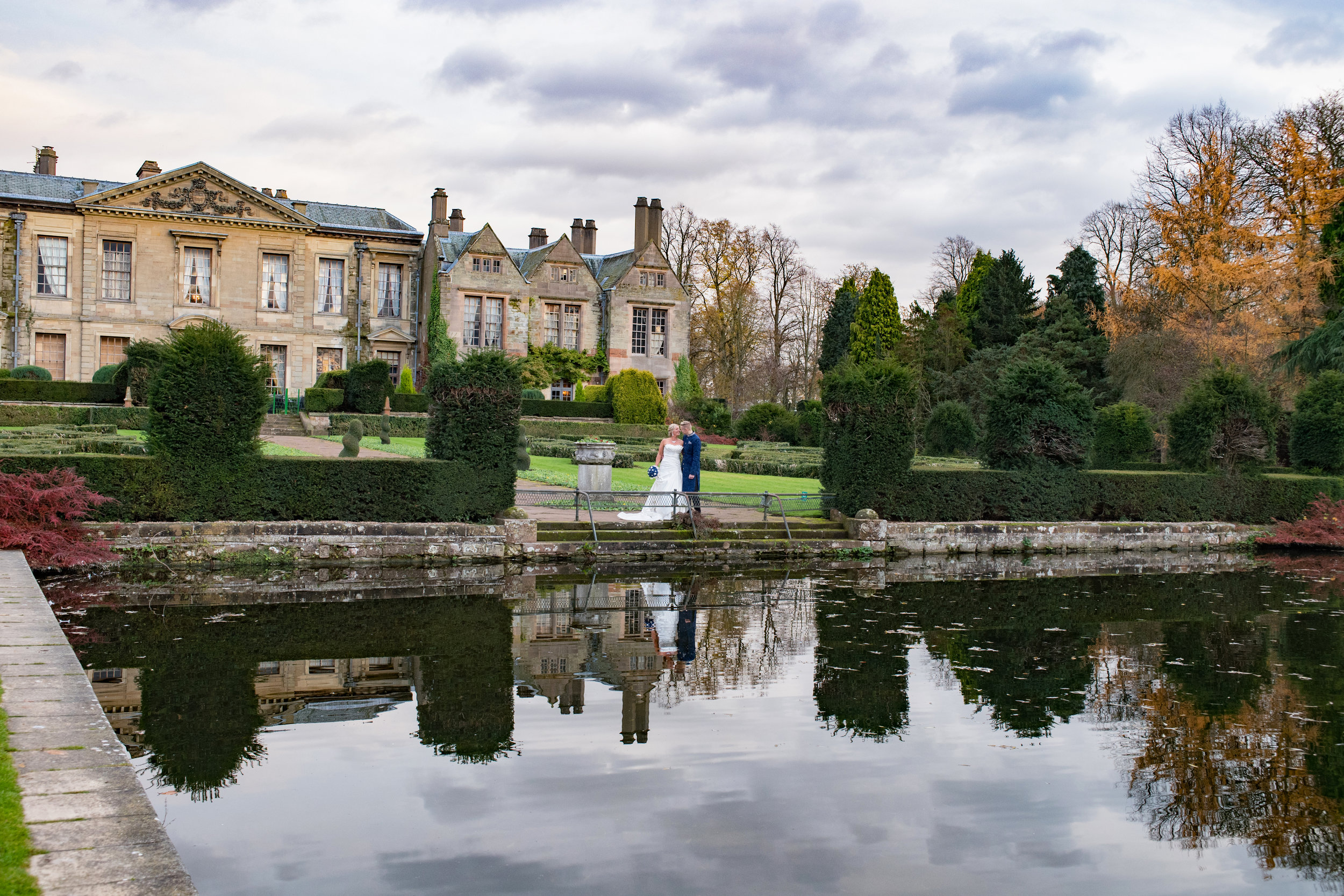 Bride and Groom by the Lake Coombe Abbey Warwickshire