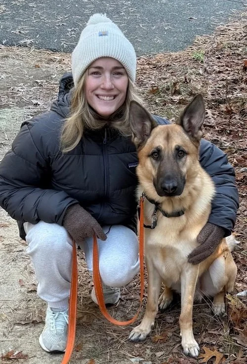 Katie, a Private Lesson Dog trainer in Cape Cod, with a German Shepherd who has completed obedience training.