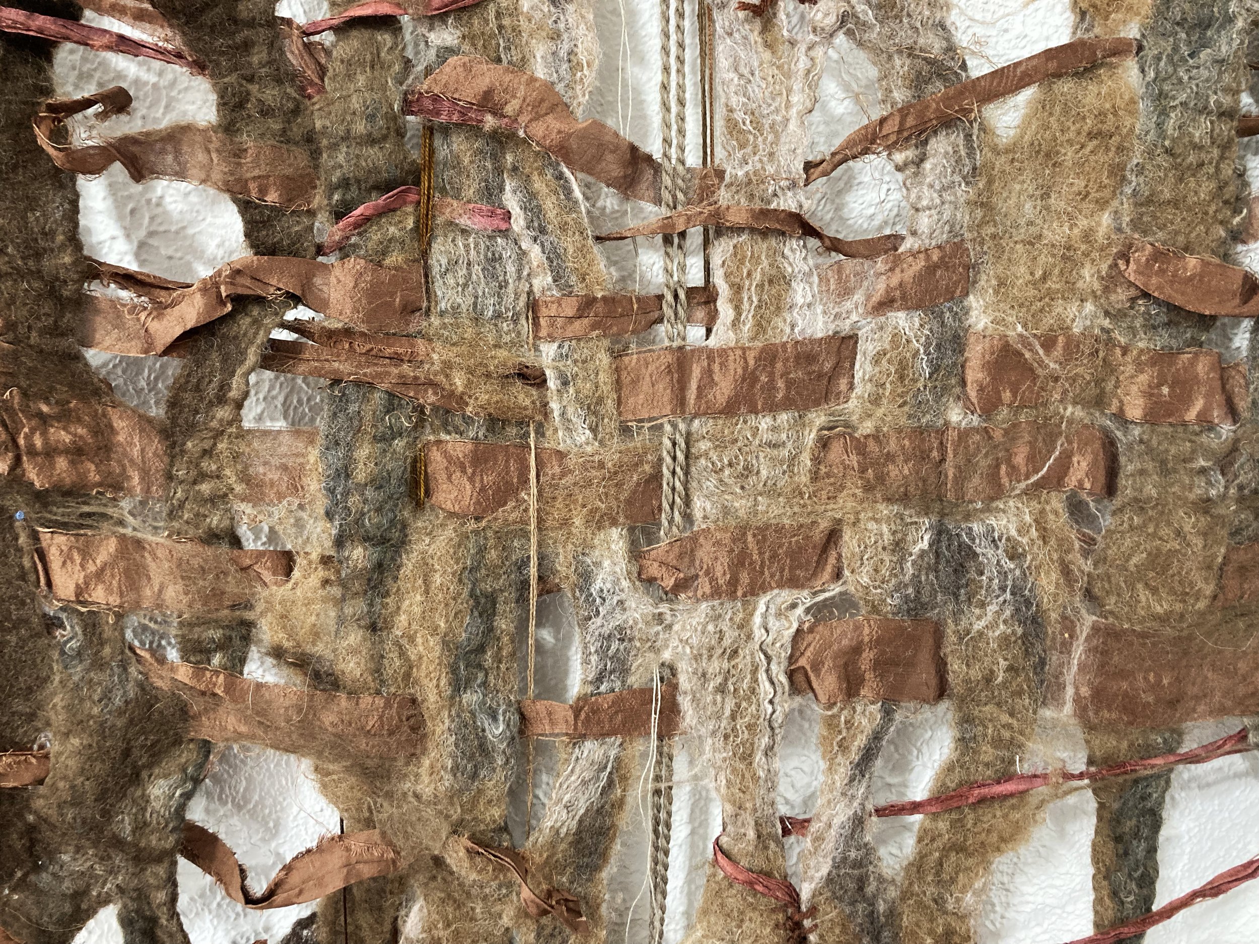  Kira Dominguez Hultgren,  The Eagle Doesn’t Fall Far from the Tree  (detail), 2022, CA wool, grandma's silk, artist's hair, LA jute, PVC, wood, 96 x 105 x 36 inches (variable) 