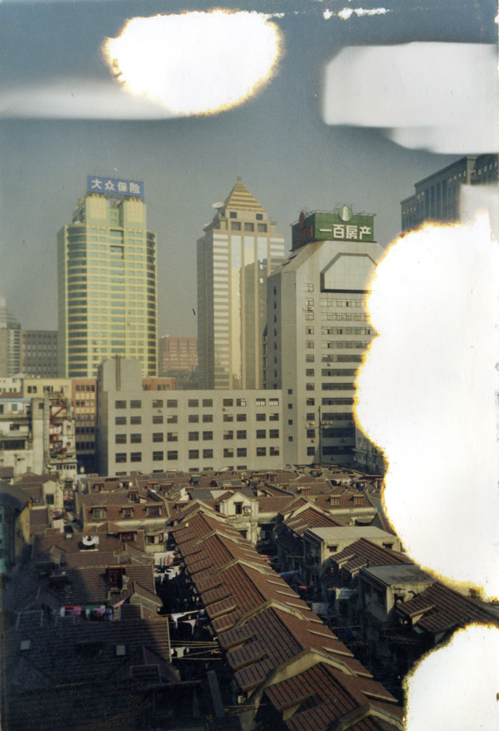 asian-big-city-skyscrapers-with-big-white-deterior-in-form-of-clouds_s.png