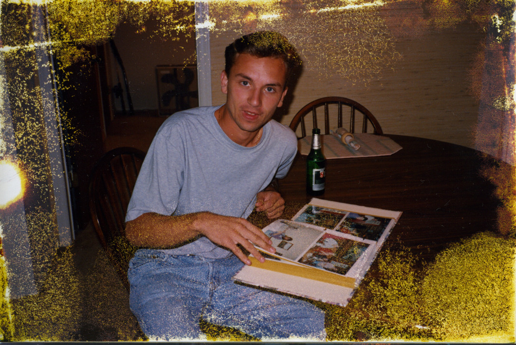 He---looking-at-photoalbum_s.png