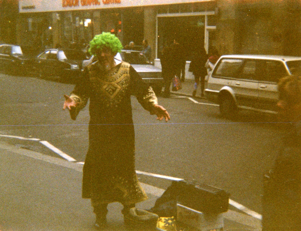 man-with-green-wig-on-the-street_s.png