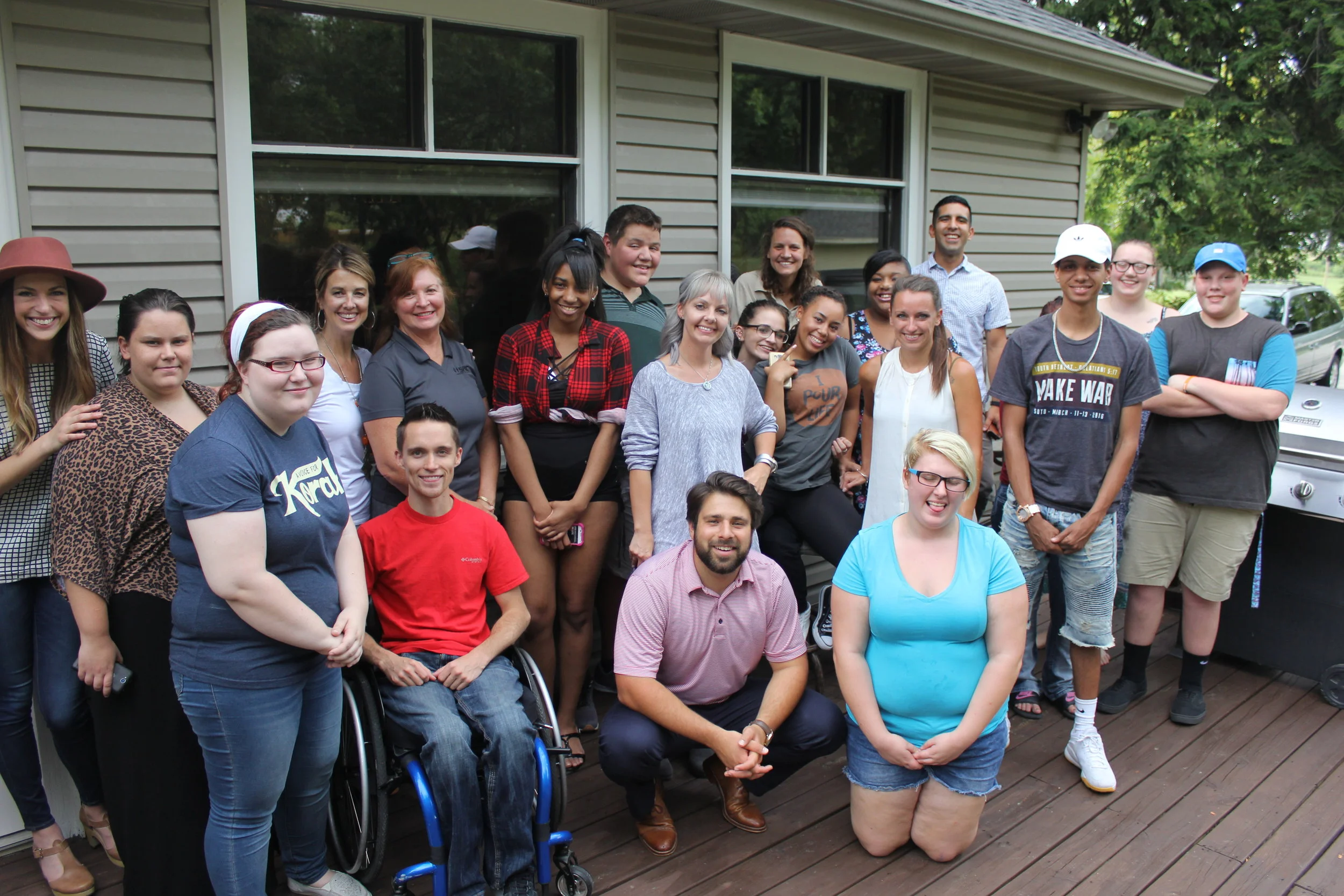 Jill Gunzenhauser (grey polo) continues to volunteer with the LifeStrengths students by teaching cooking classes and coordinating volunteer groups.