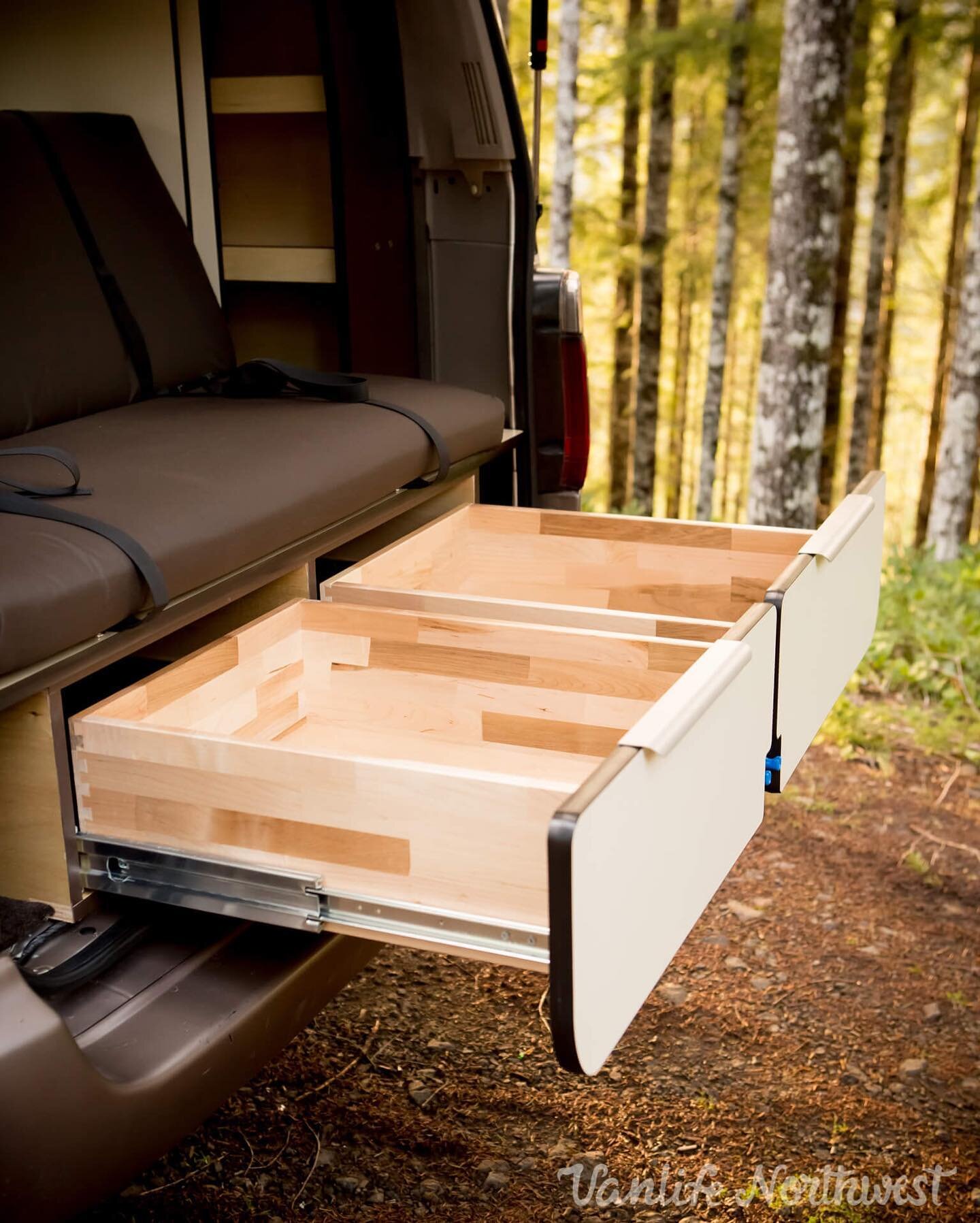 Aft storage drawers supported by 500 lb. rated locking slides on our #SpaceCabin camper, designed specifically to fit the Toyota Hiace Super Custom van. /// We always have more vans in the works, so shoot us a call and let&rsquo;s chat about our proc