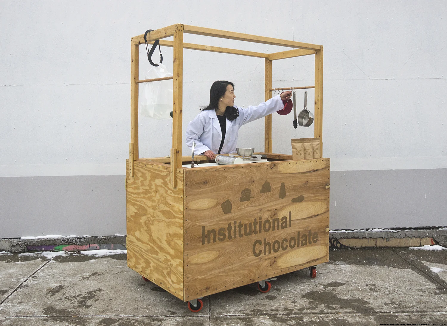 Bonam Kim, Mobile Kitchen, 2017, Wood, wheel, paint, table, kitchen ware, 33 x 55 x 75 in.