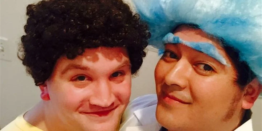 Alex Garcia (right) and his husband, Billy Conwell, dressed up as Rick and Morty for Halloween 2016.