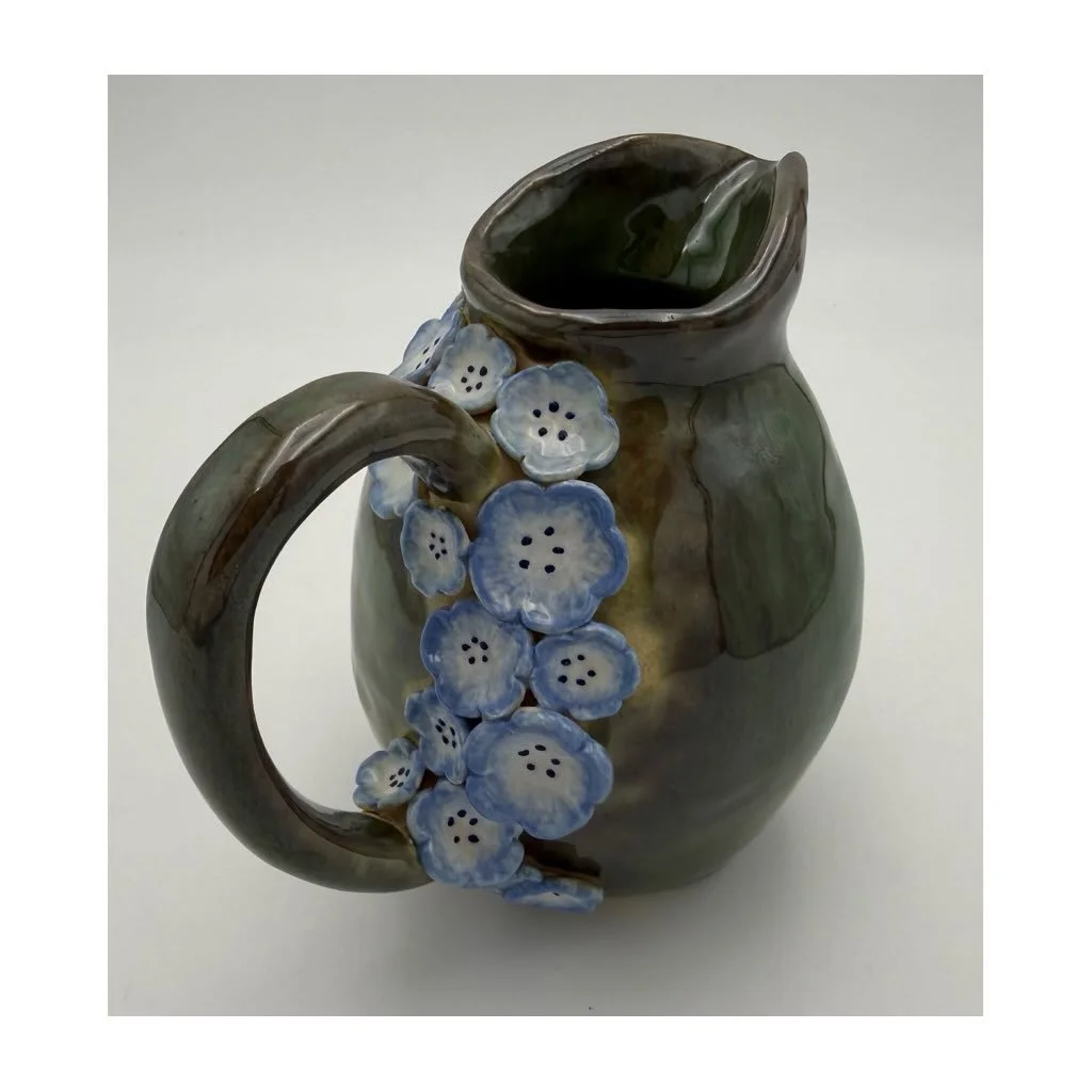 How lovely is this blossom adorned pitcher made by one of our teen ceramicists?!😍🌸