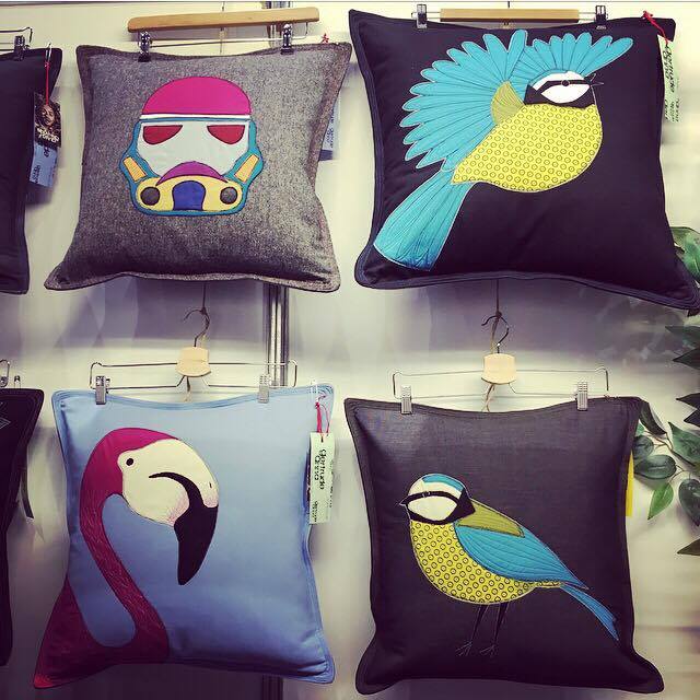 Gertrude Anna . These playful colourful cushions feature anything from flamingos, ravens, stags to hares and storm troopers. Made using scrap fabric, Timmy, the man behind the brand uses a 'waste not, want not' approach to his designs.