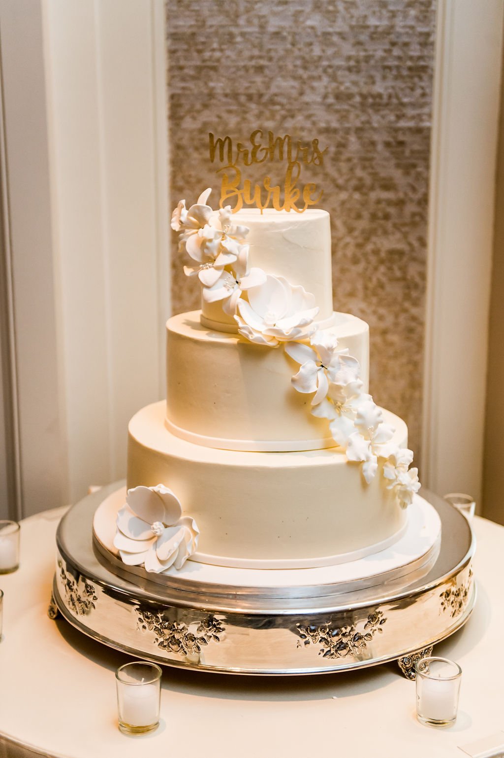 Three tier wedding cake with sugar flowers