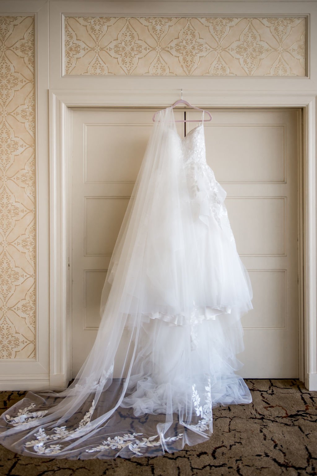 Lace wedding gown hanging