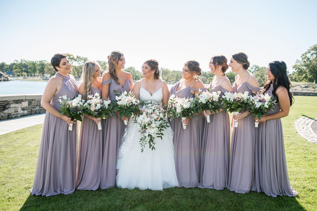 Bridal party in lavender gowns at Glen Island Harbour Club