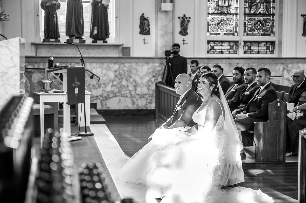Wedding ceremony at St. Claire of Assisi in The Bronx