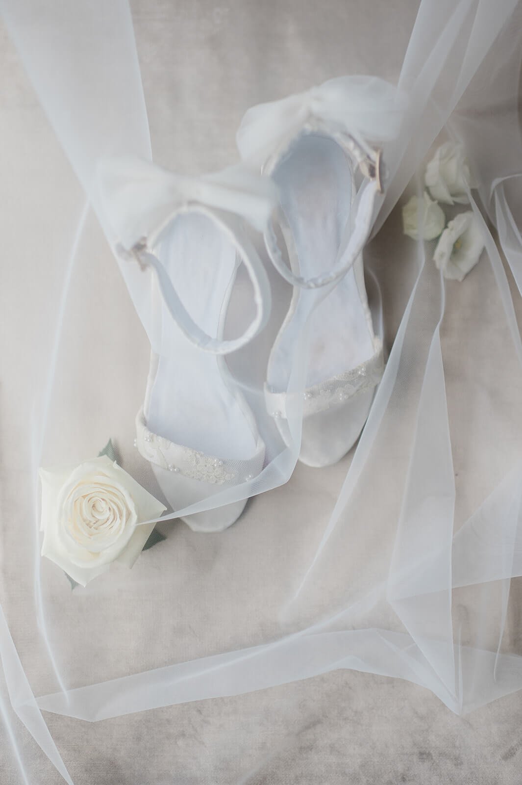 White lace bride heels with a veil