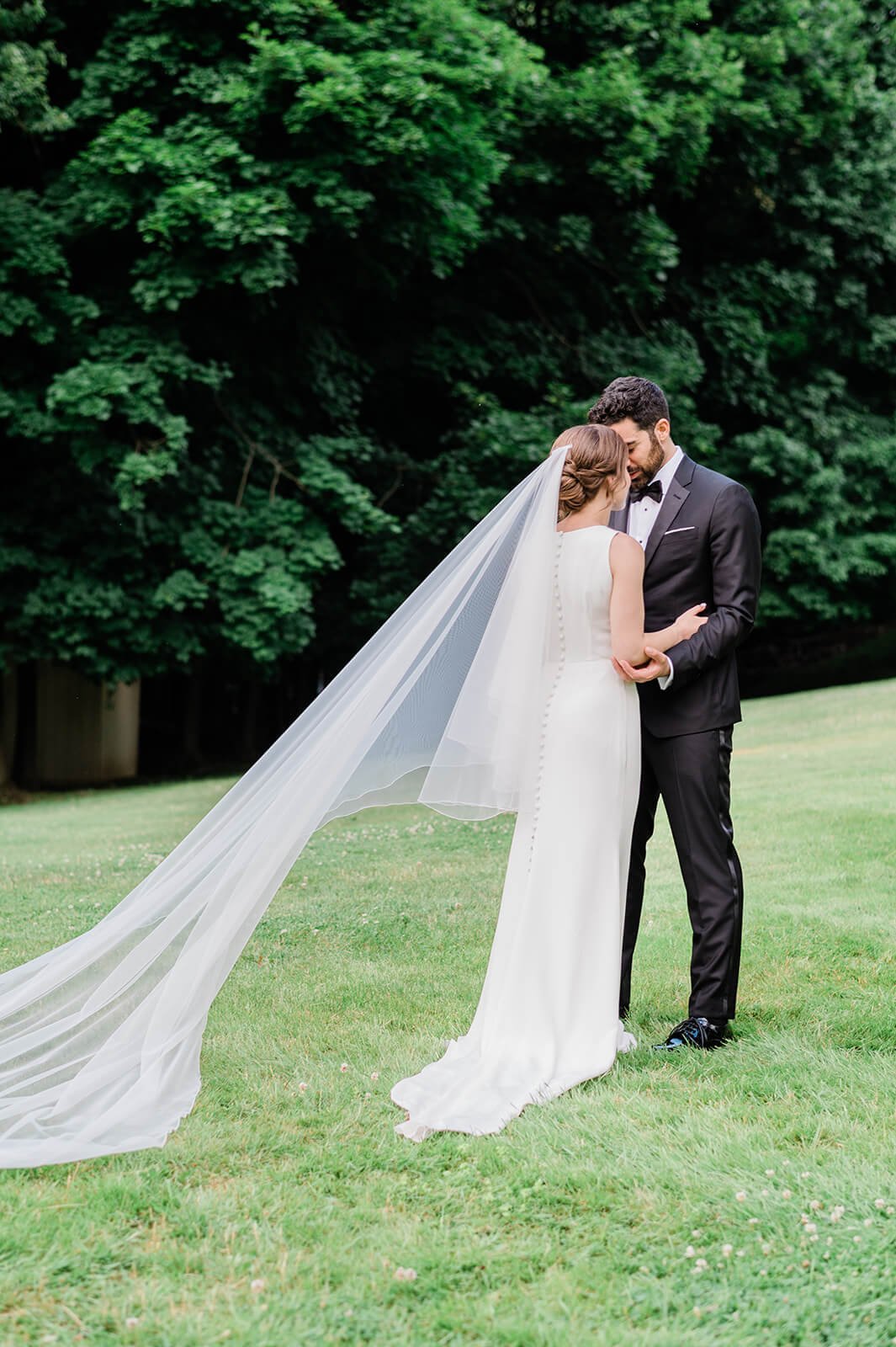 Bride and groom first look on the lawn of Tappan Hill Mansion