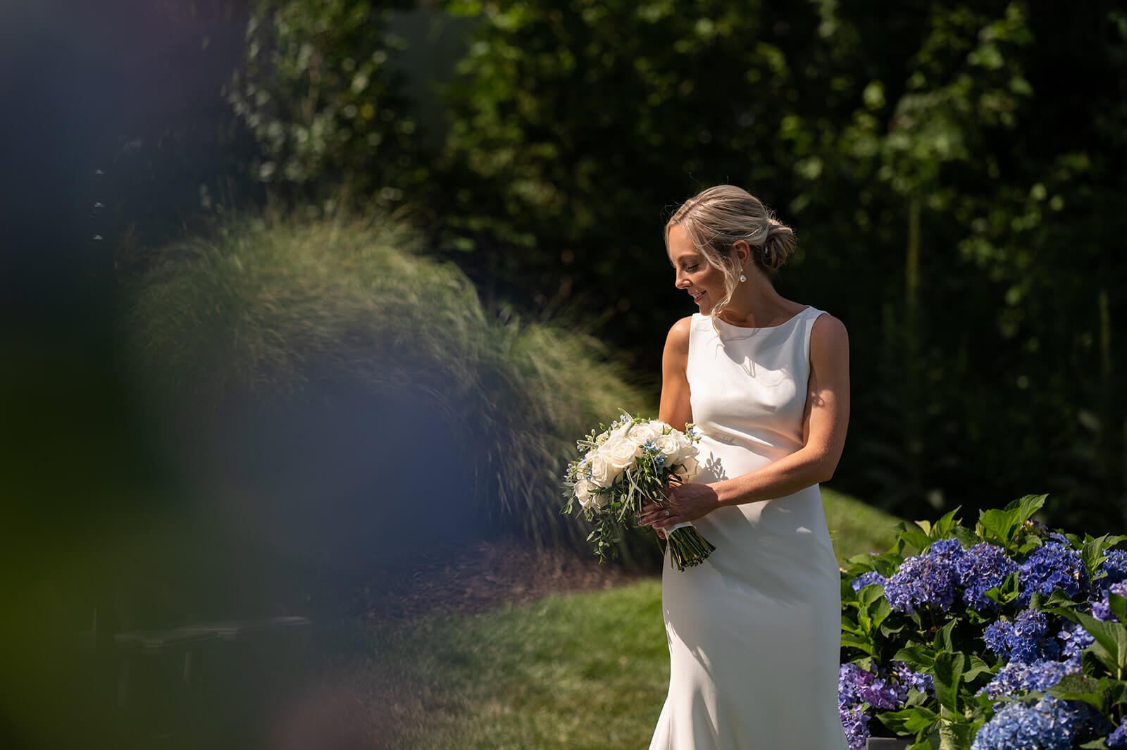 Bride in a classic gown by Theia