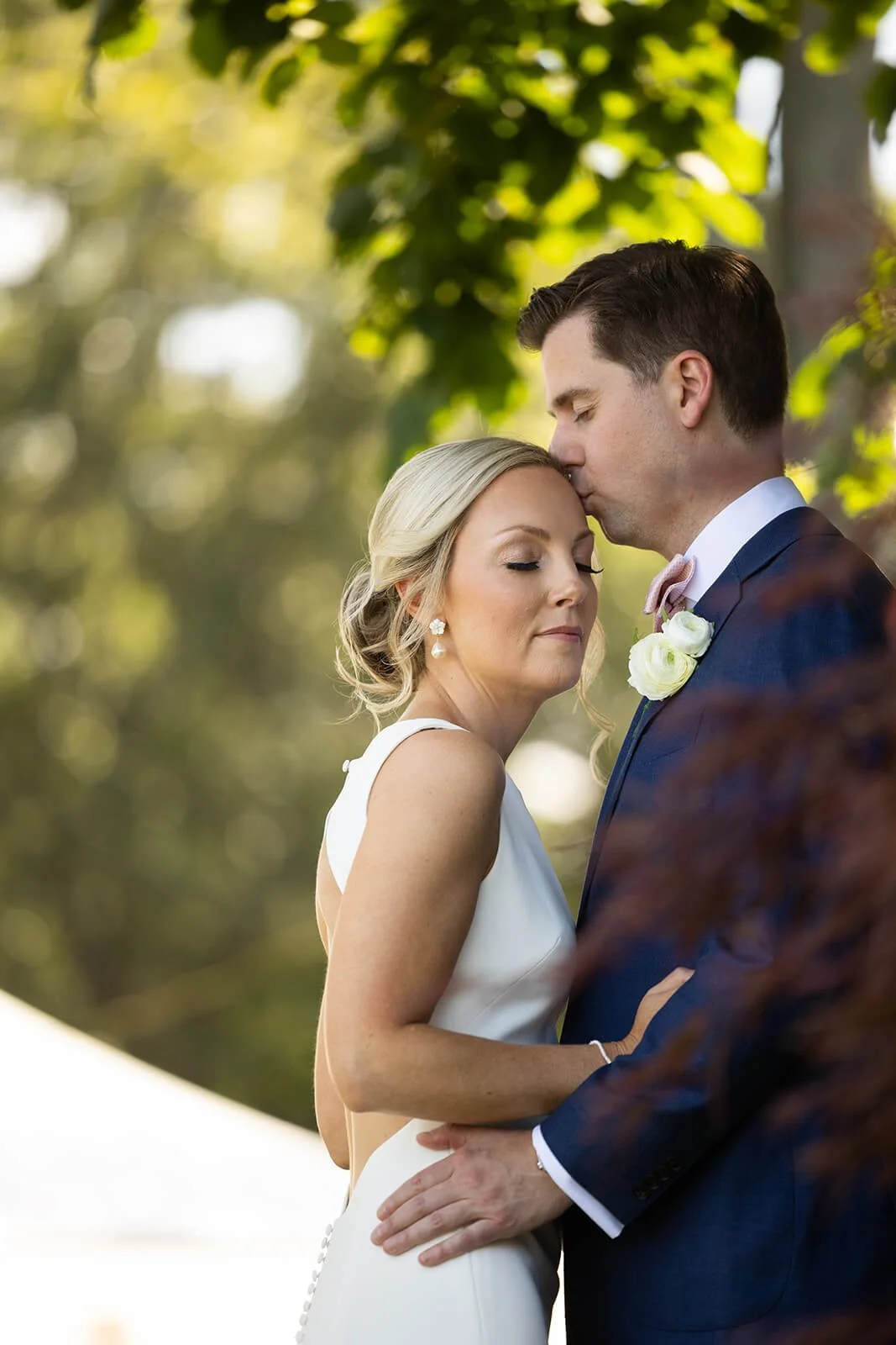 Couples wedding day portraits at a private residence on Long Island, overlooking Huntington Bay.