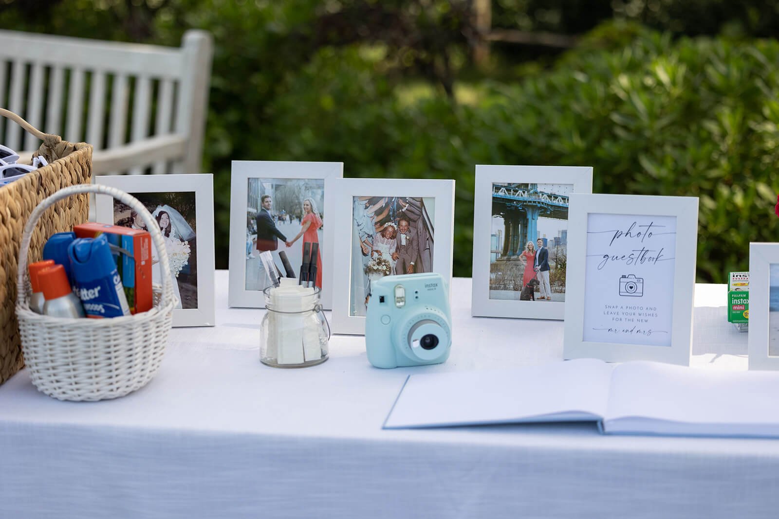 Wedding ceremony details, including family wedding day pictures framed