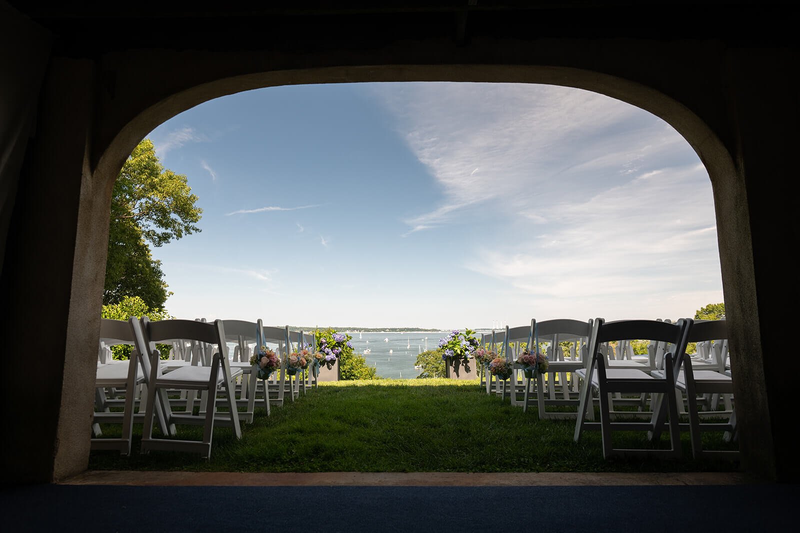 Backyard wedding ceremony in New York, overlooking Huntington Bay.