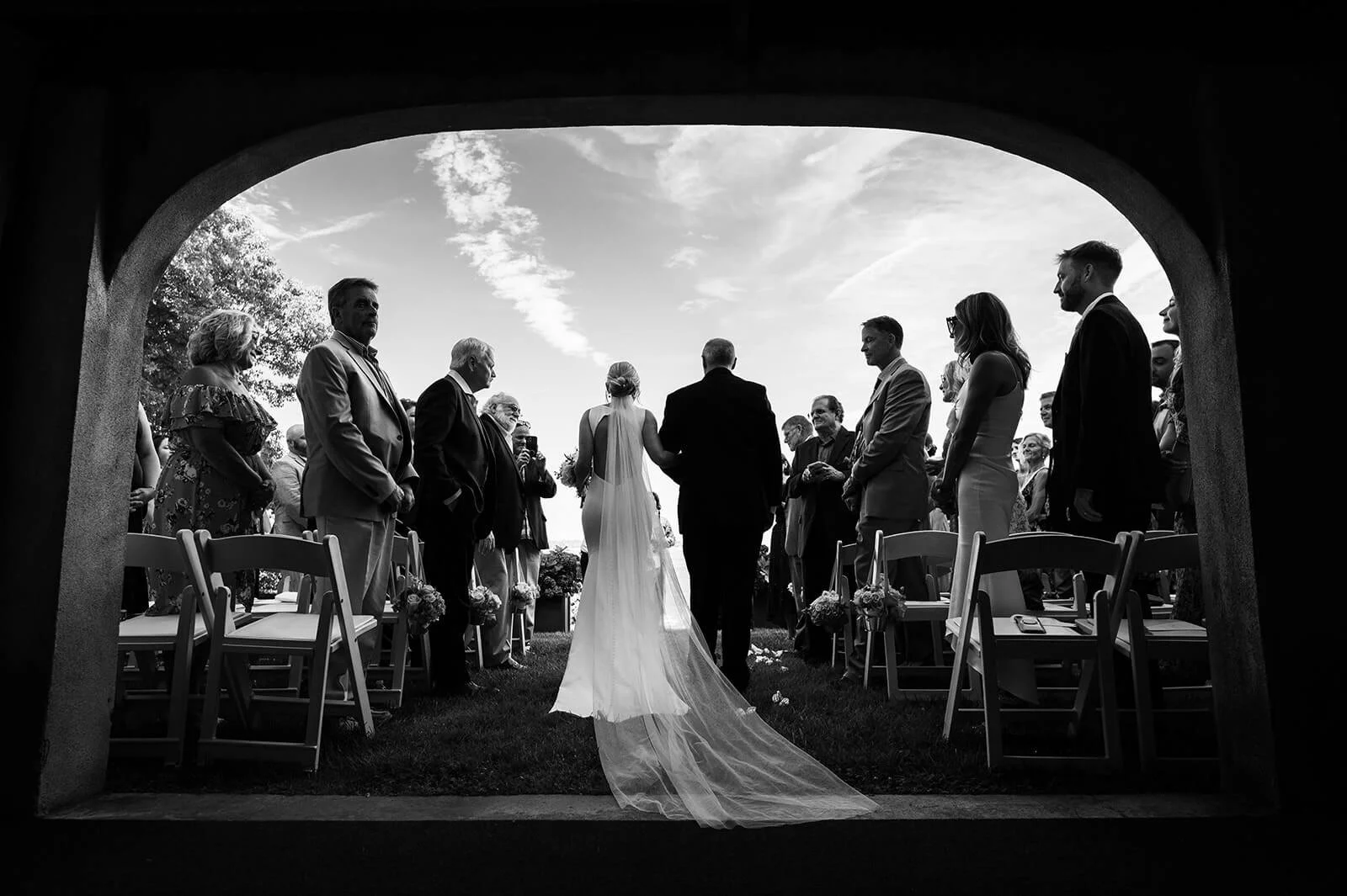 Backyard wedding ceremony in New York, overlooking Huntington Bay.