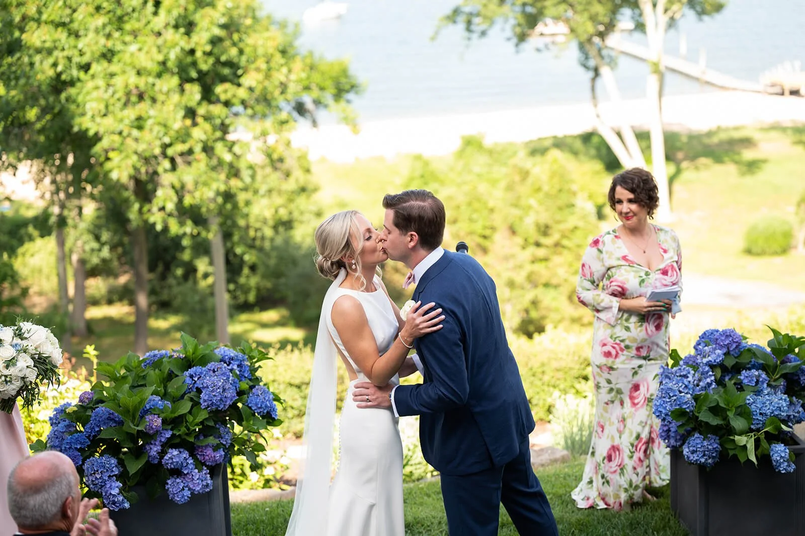 Bride and groom first kiss