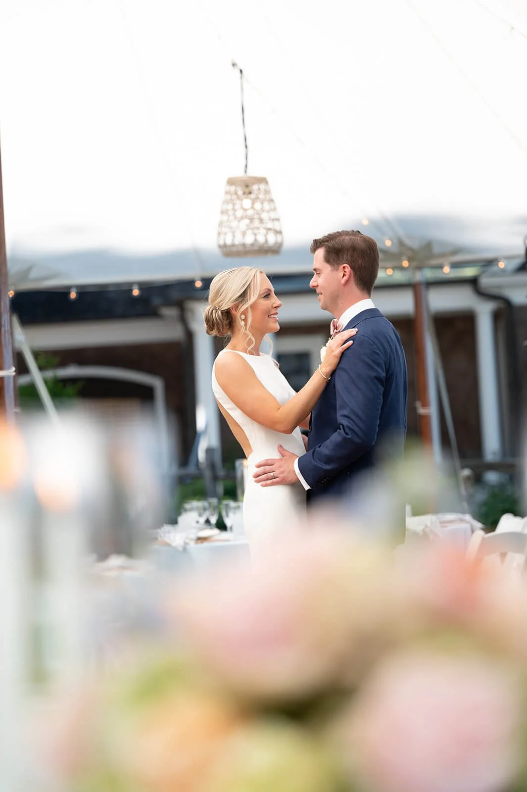 Luxury tented backyard wedding in Long Island, New York, overlooking Huntington Bay.