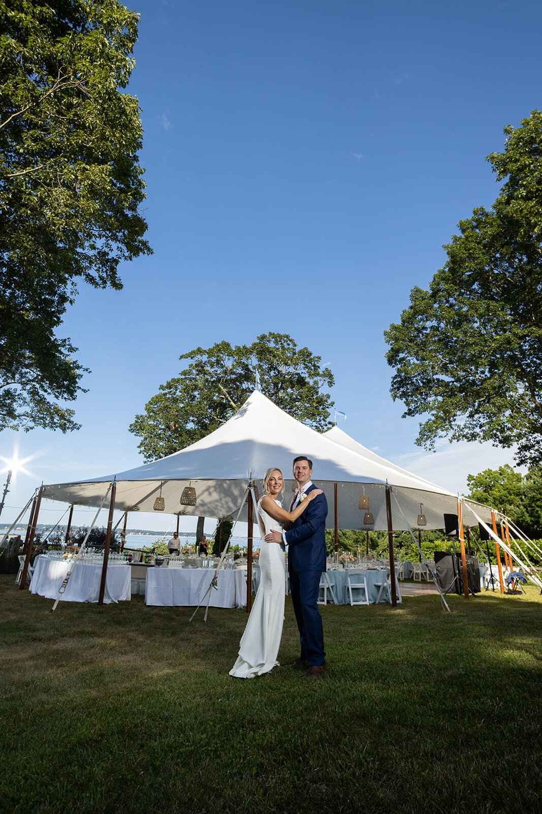 Luxury tented backyard wedding in Long Island, New York, overlooking Huntington Bay.