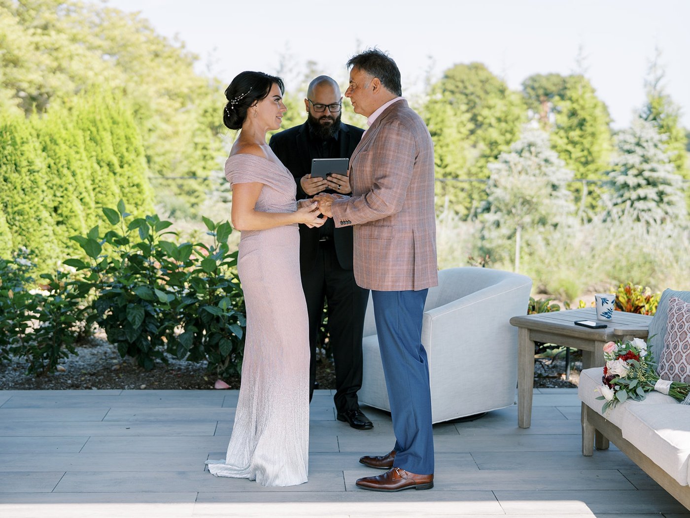 Summer backyard wedding ceremony in Blue Point 