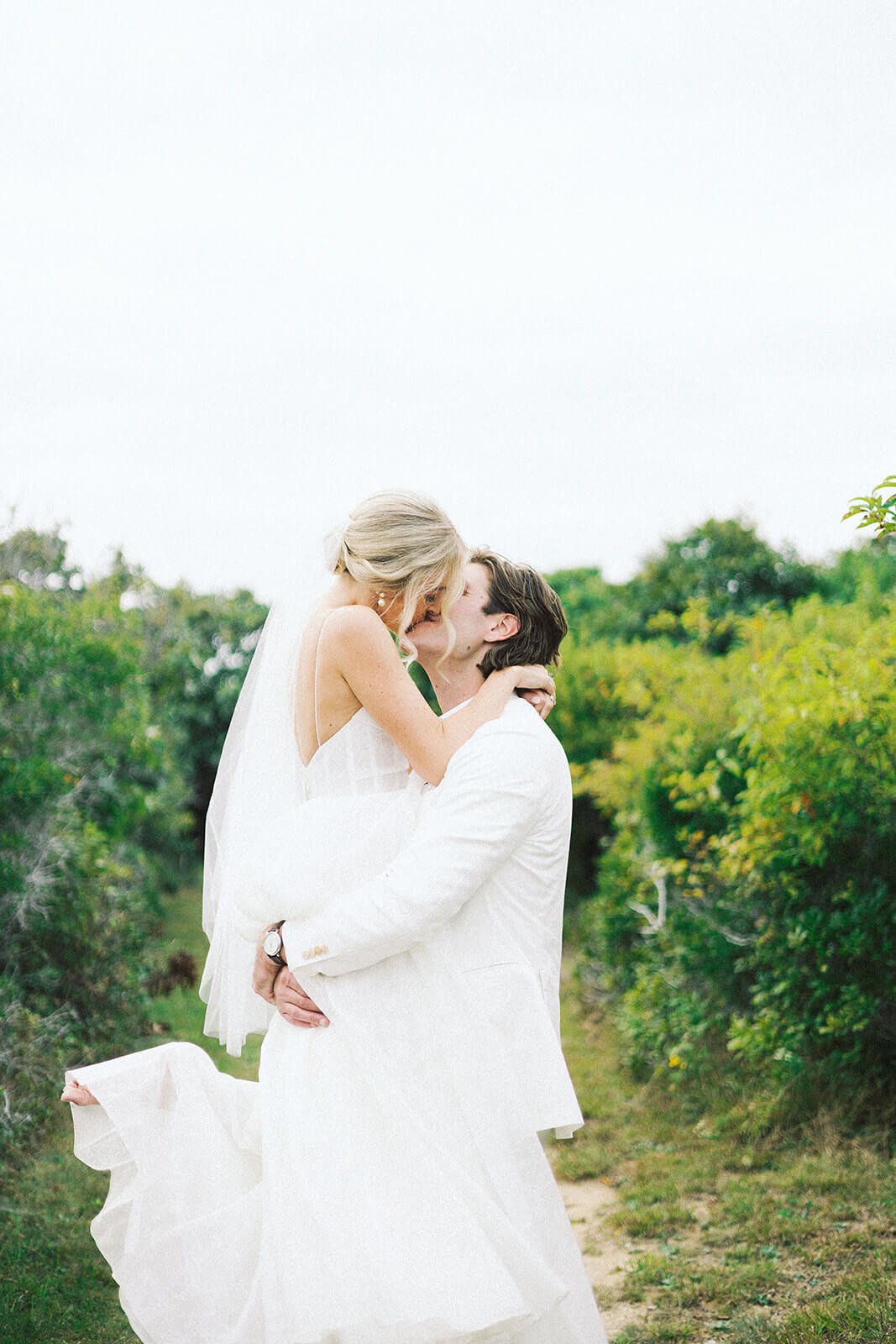 Intimate backyard wedding ceremony at a private home in Montauk, New York