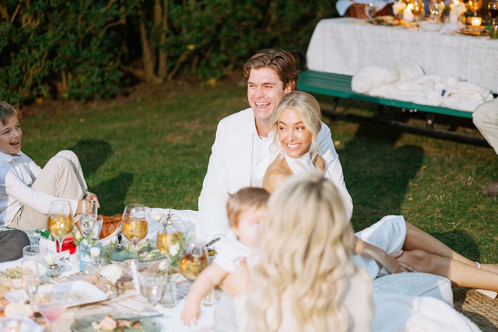 Intimate backyard wedding at a private home in Montauk, New York with picnic-style reception.