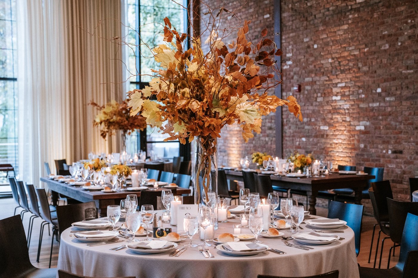 A centerpiece with fall leaves and branches by Athabold