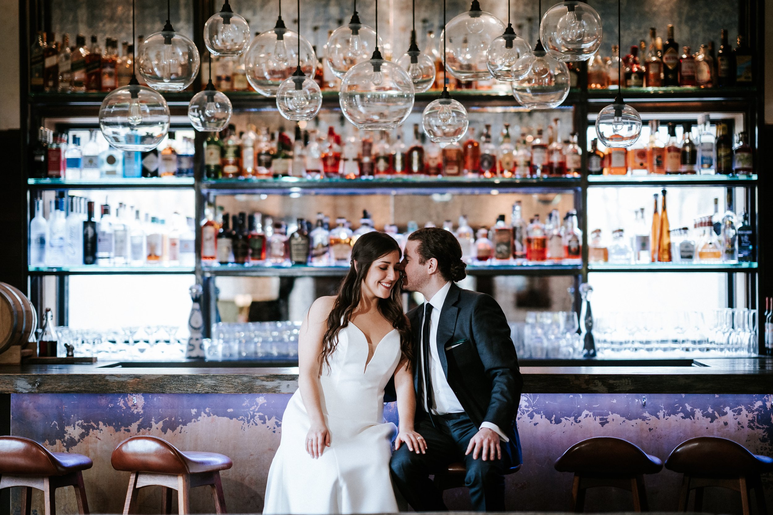 Bride and groom first look inside a bar in Beacon, New York