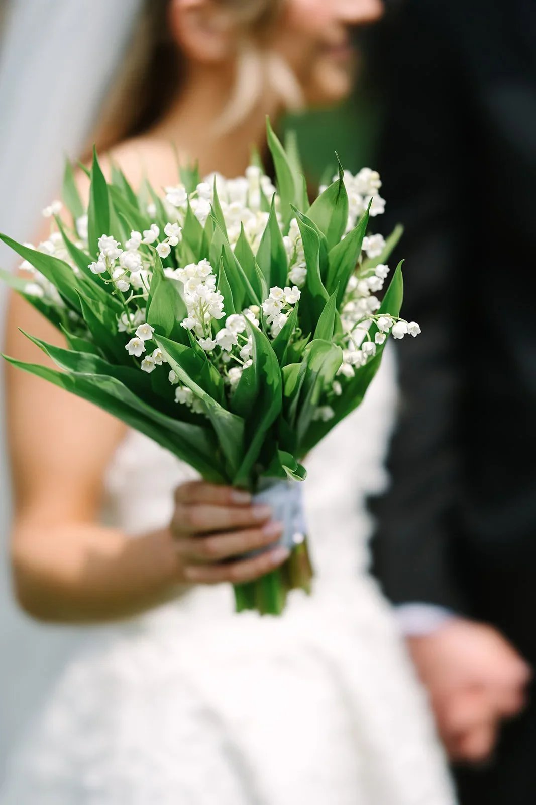 brides floral bouquet with white delicate flowers