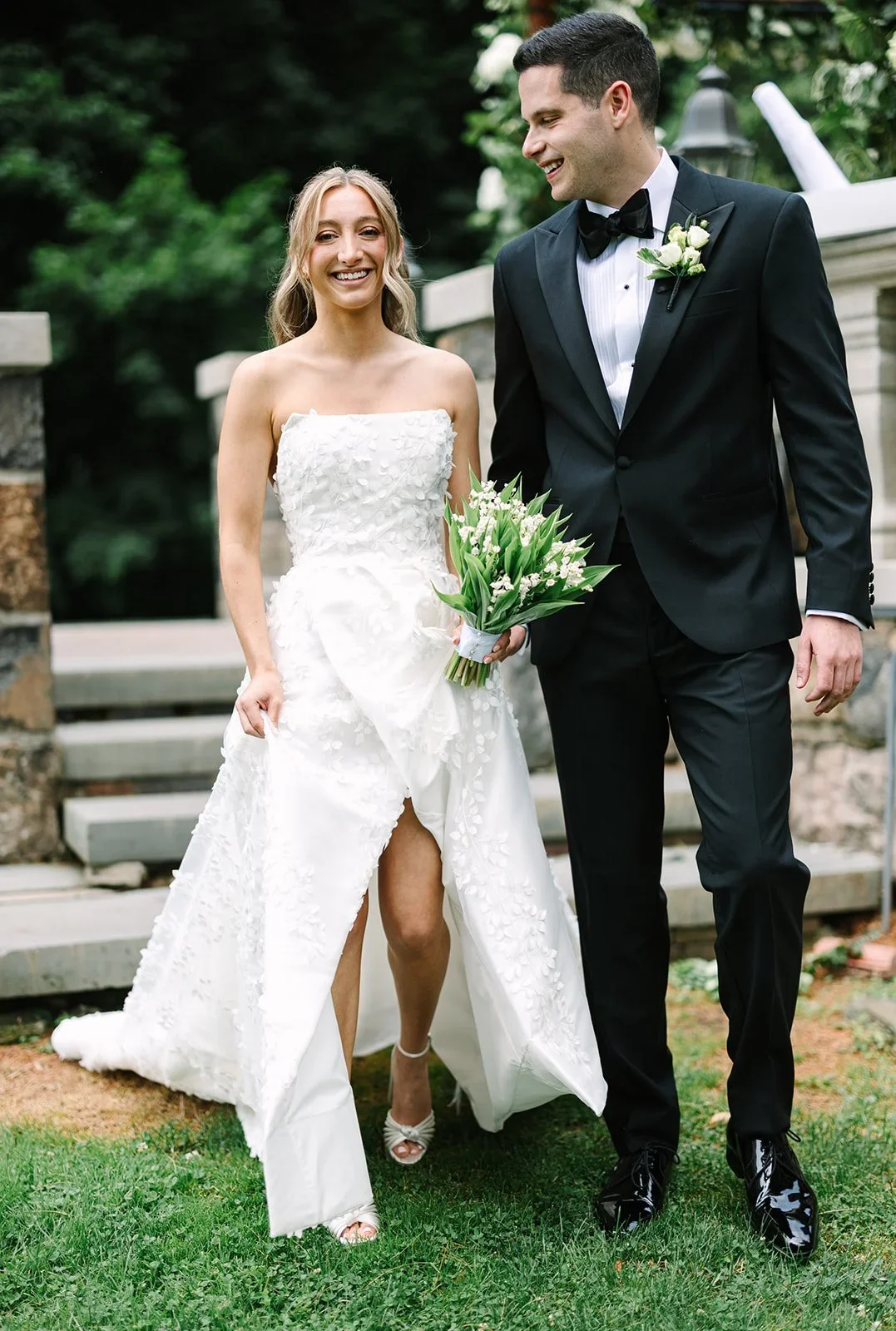 Bride and groom smiling together during a joyful portrait moment, capturing the emotion of the day